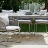 Moments eleganckie krzesło ogrodowe na płozie 2 kolory Soft Rope szare krzesło poduszka jasnoszary Light grey luksusowe meble ogrodowe Cane-line stół ogrodowy