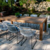Nimes Dinan zestaw ogrodowy stołowy 8-10 osób stół teakowy ogrodowy Nimes 240 cm 8 krzeseł Dinan rattan biały Vimine luksusowe meble ogrodowe